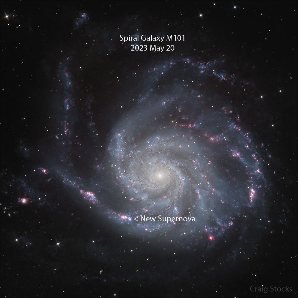 A sprawling spiral galaxy is pictured with a new bright spot
visible near the image bottom. This spot is a recently discovered 
supernova. A roll-over image shows the same galaxy in an image
taken the previous month without the new supernova spot.
Please see the explanation for more detailed information.