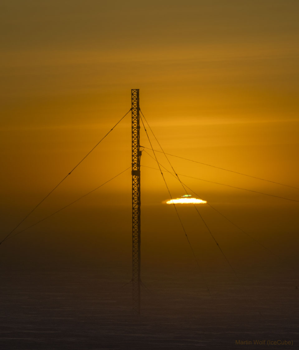 The picture shows the sun rising last week at the South Pole
during equinox. A communications tower marks the foreground, and 
the Sun shows a green flash at the top. 
Please see the explanation for more detailed information.