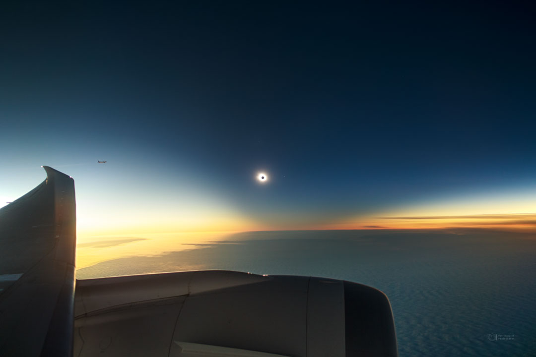 The featured image shows the total solar eclipse of
2021 November 4 from an airplane flying over Antarctica.
Please see the explanation for more detailed information.