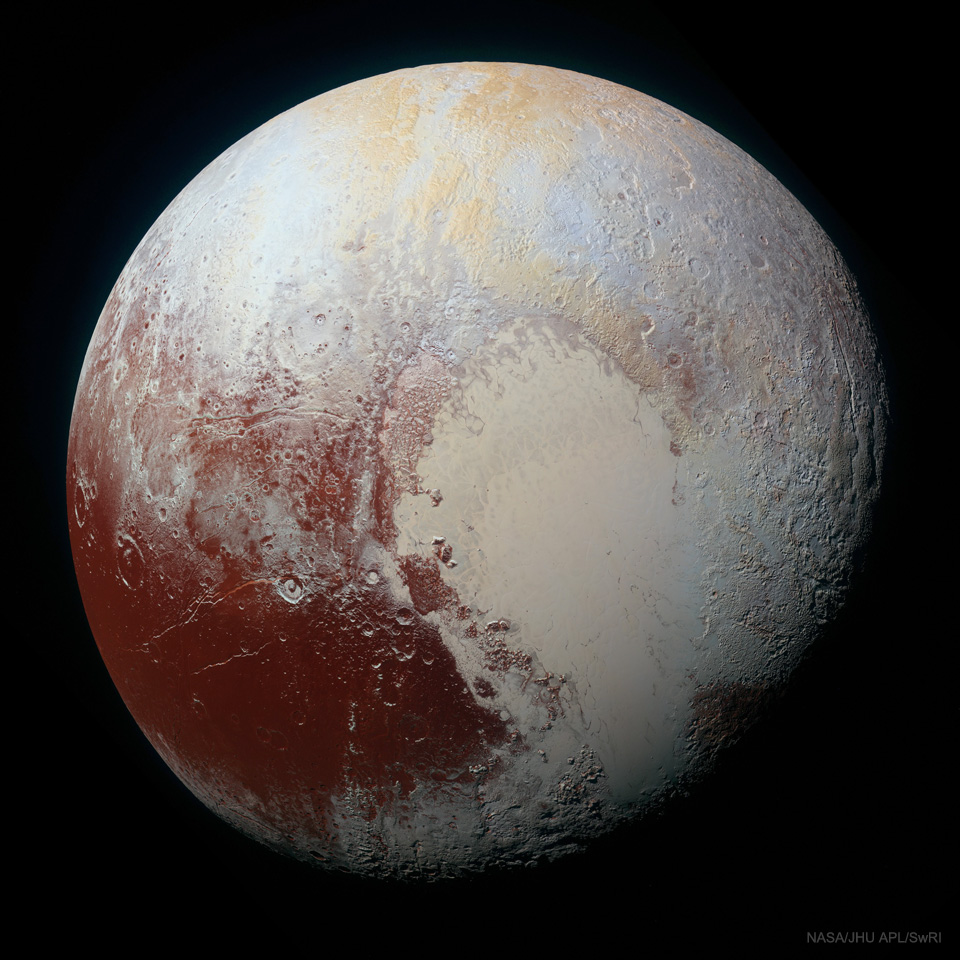 The picture shows Pluto in enhanced colours and high resolution
and seen by the passing New Horizons spacecraft in 2015.
Please see the explanation for more detailed information.