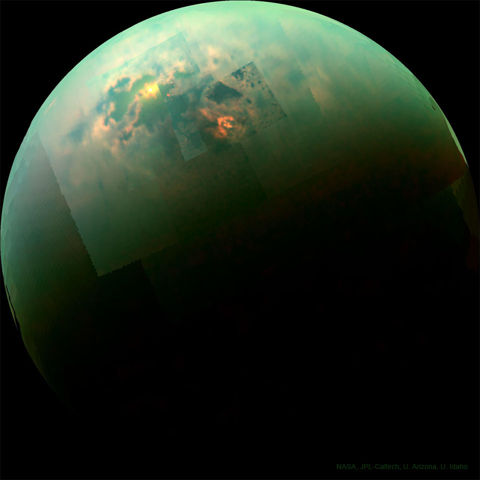 The featured image depicts Saturn's moon Titan as 
captured by the Cassini mission in 2014. The infrared
image is coloured green and includes bright sunglint
from surface seas.
Please see the explanation for more detailed information.