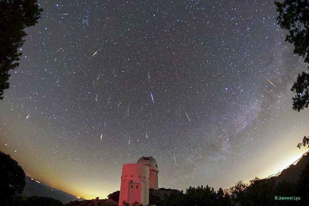 The featured image shows meteors from the usual docile
Tau Herculids meteor shower. The image records 19 images from the 
shower, with 3 other meteors also captured. In the foreground are
two telescopes from Kitt Peak: the 2.3-metre Bok telescope and the
4-metre Mayall telescope.
Please see the explanation for more detailed information.