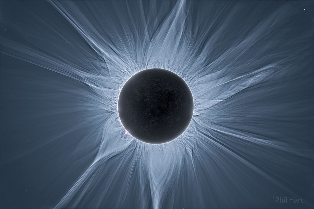 The Sun is shown during a total solar eclipse. Accentuated
is the expansive corona of the Sun, which is shown streaming
out in all directions. 
Please see the explanation for more detailed information.